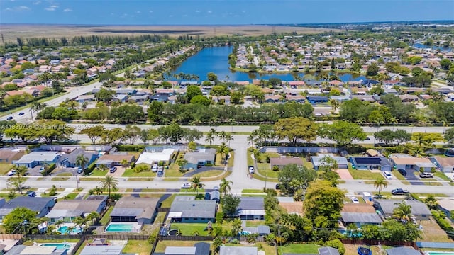 11940 NW 33rd St, Sunrise, FL 33323 - aerial overview of property's location with nearby suburban area and a nearby body of water