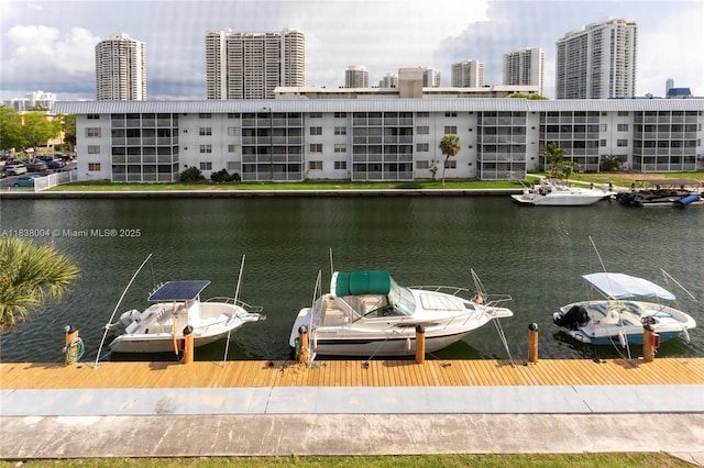 3551 NE 169th St Unit 411, North Miami Beach, FL 33160 - water view with nearby urban area and a boat dock