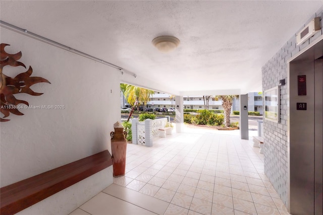 3551 NE 169th St Unit 411, North Miami Beach, FL 33160 - view of patio / terrace featuring elevator