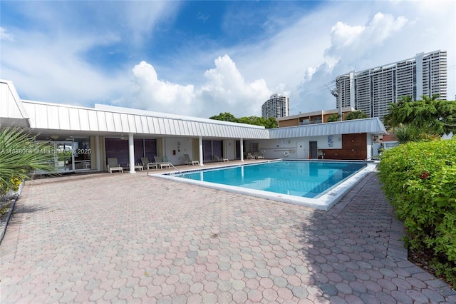 3551 NE 169th St Unit 411, North Miami Beach, FL 33160 - community pool with a patio area