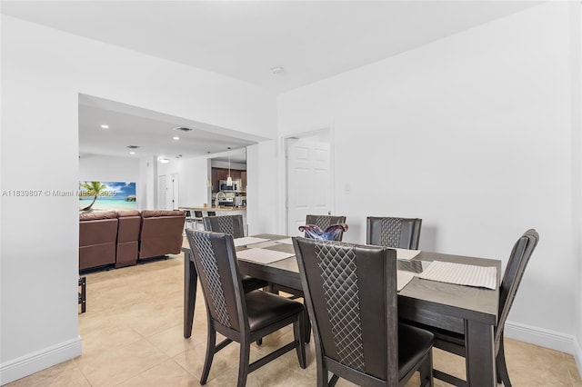 11420 SW 44th St, Miami, FL 33165 - dining space with light tile patterned floors and recessed lighting