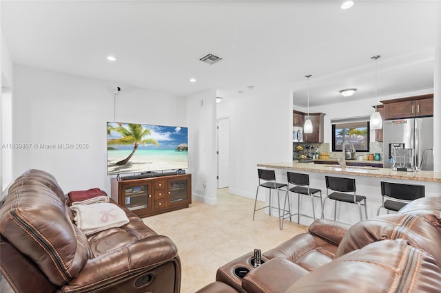 11420 SW 44th St, Miami, FL 33165 - living area featuring recessed lighting and baseboards