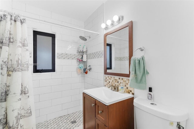11420 SW 44th St, Miami, FL 33165 - full bathroom with vanity, a tile shower, and decorative backsplash