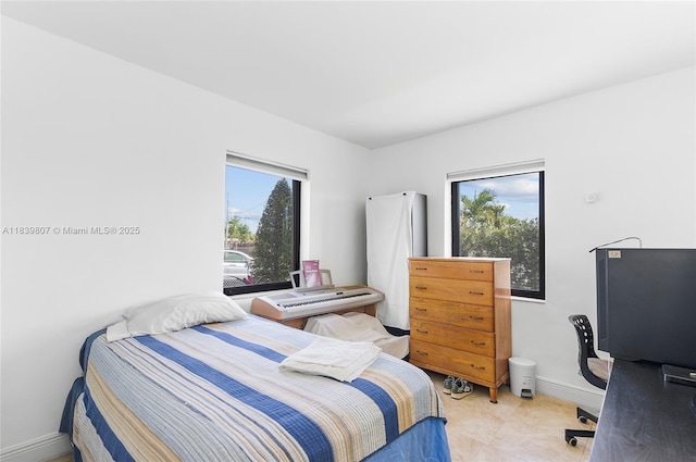 11420 SW 44th St, Miami, FL 33165 - bedroom featuring baseboards and a desk