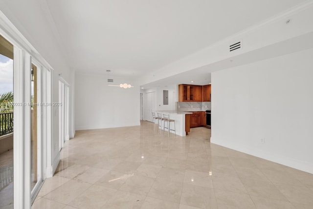 20 Calabria Ave Unit 505, Coral Gables, FL 33134 - unfurnished living room featuring electric panel and baseboards