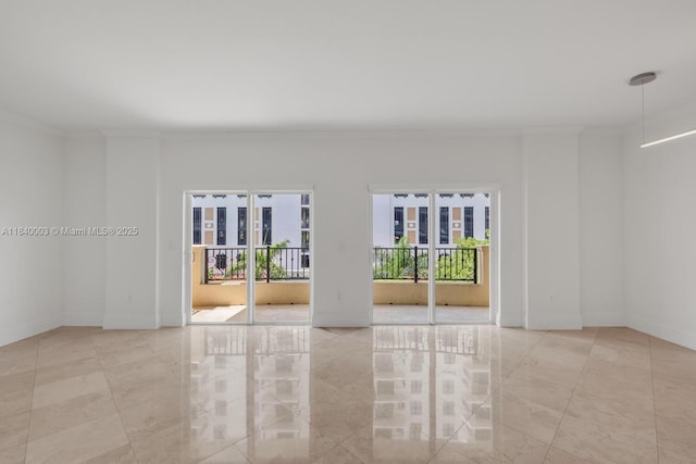 20 Calabria Ave Unit 505, Coral Gables, FL 33134 - unfurnished room with ornamental molding and marble finish flooring