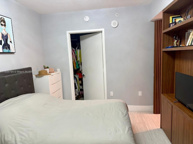 300 Sunny Isles Blvd Unit 4-1806, Sunny Isles Beach, FL 33160 - bedroom with baseboards and a walk in closet