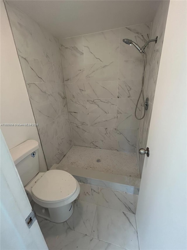 4632 NW 90th Ave, Sunrise, FL 33351 - bathroom featuring marble look tile flooring and a shower stall
