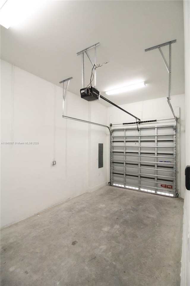 8074 NW 43rd St, Doral, FL 33166 - garage featuring a garage door opener and electric panel