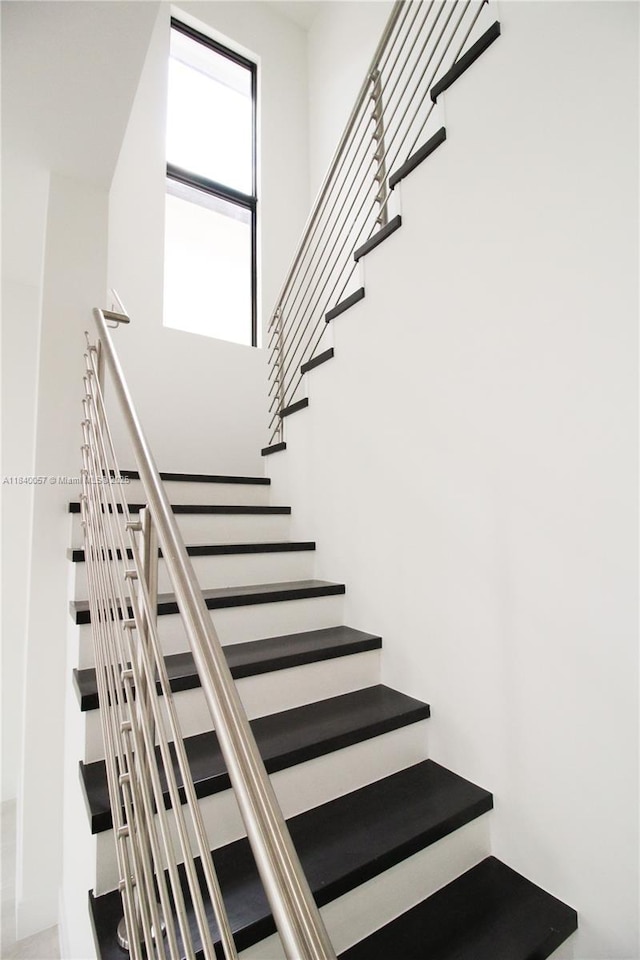 8074 NW 43rd St, Doral, FL 33166 - stairs featuring a towering ceiling