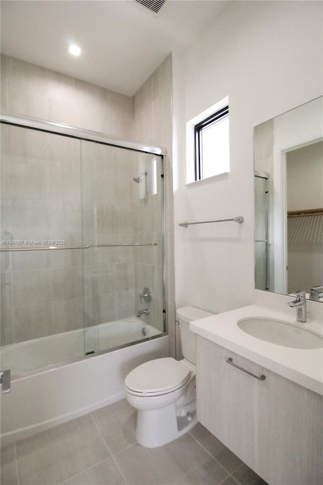 8074 NW 43rd St, Doral, FL 33166 - full bath featuring vanity, shower / bath combination with glass door, and tile patterned flooring