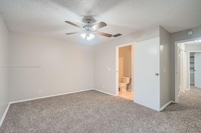 10897 Grandview Ct, Royal Palm Beach, FL 33411 - unfurnished bedroom featuring light carpet, a textured ceiling, and ceiling fan