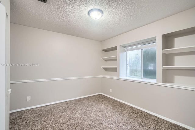 10897 Grandview Ct, Royal Palm Beach, FL 33411 - unfurnished room featuring carpet floors and a textured ceiling