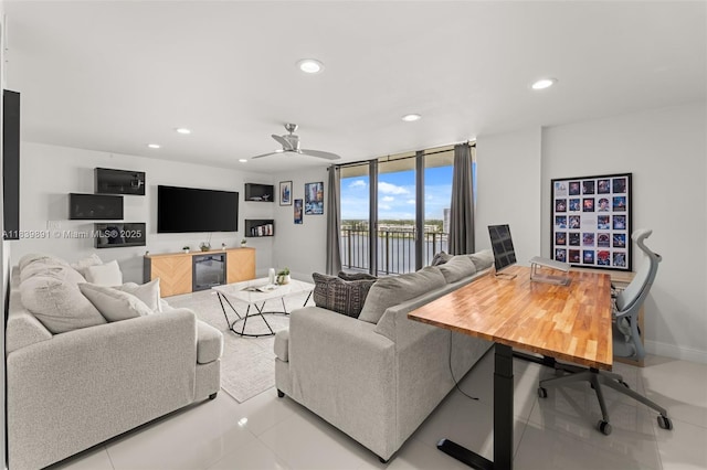 18181 NE 31st Ct Unit 1401, Aventura, FL 33160 - living room featuring recessed lighting, a ceiling fan, tile patterned flooring, beverage cooler, and a wall of windows