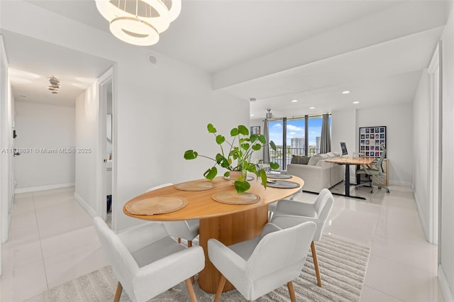 18181 NE 31st Ct Unit 1401, Aventura, FL 33160 - dining area featuring light tile patterned flooring, a chandelier, and recessed lighting