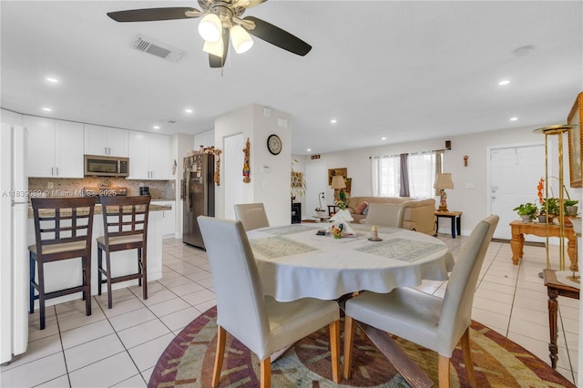 18030 SW 153rd Ct, Miami, FL 33187 - dining space featuring light tile patterned flooring, a ceiling fan, and recessed lighting