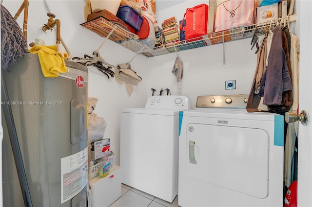 18030 SW 153rd Ct, Miami, FL 33187 - laundry room with separate washer and dryer, electric water heater, and light tile patterned floors