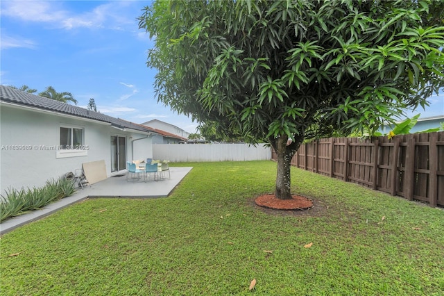 18030 SW 153rd Ct, Miami, FL 33187 - fenced backyard featuring a patio area