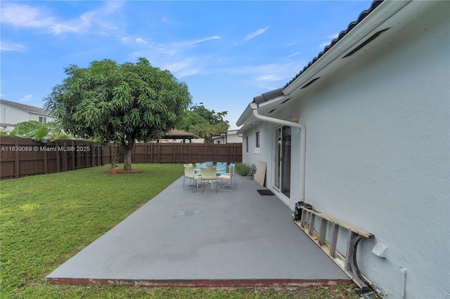18030 SW 153rd Ct, Miami, FL 33187 - fenced backyard with outdoor dining area and a patio