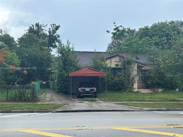 1739 SW 12th Ave, Miami, FL 33129 - view of front of property with a detached carport, a tiled roof, and concrete driveway