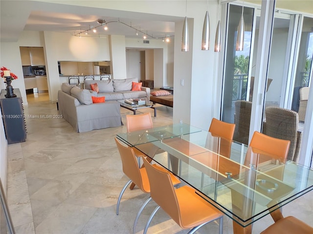 445 Grand Bay Dr Unit 601, Key Biscayne, FL 33149 - dining space featuring track lighting