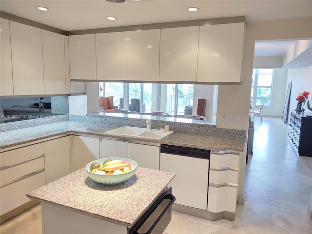 445 Grand Bay Dr Unit 601, Key Biscayne, FL 33149 - kitchen featuring dishwasher, white cabinets, a center island, recessed lighting, and light stone countertops