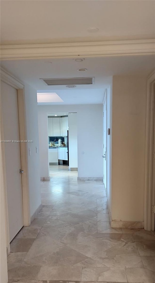 445 Grand Bay Dr Unit 601, Key Biscayne, FL 33149 - hallway featuring baseboards