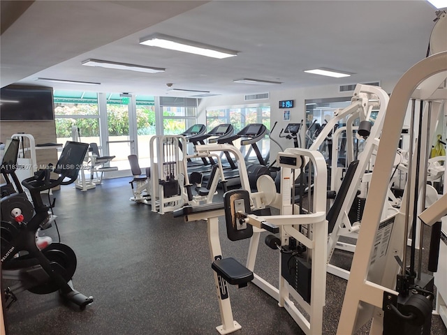 445 Grand Bay Dr Unit 601, Key Biscayne, FL 33149 - exercise room featuring expansive windows