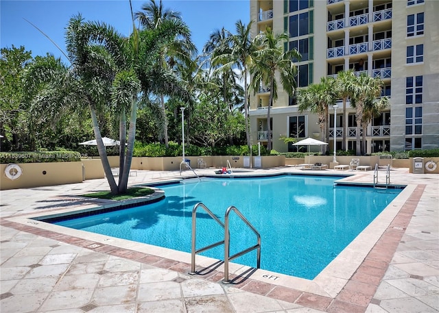 445 Grand Bay Dr Unit 601, Key Biscayne, FL 33149 - community pool featuring a patio