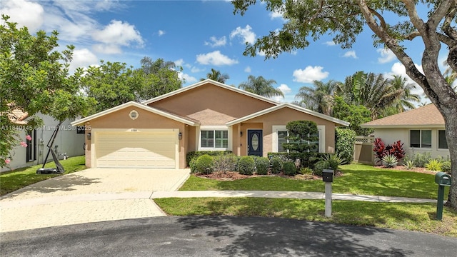 1710 SW 100th Ter, Davie, FL 33324 - single story home with an attached garage, driveway, and stucco siding