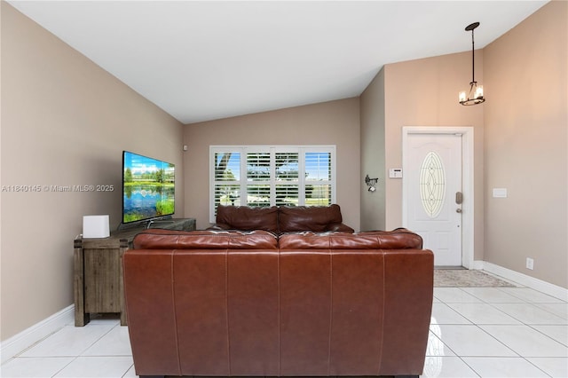 1710 SW 100th Ter, Davie, FL 33324 - living area with lofted ceiling, light tile patterned floors, and a chandelier