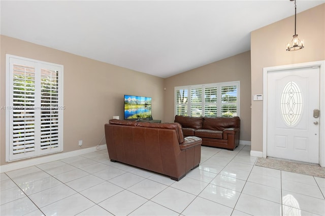 1710 SW 100th Ter, Davie, FL 33324 - living area featuring lofted ceiling, light tile patterned floors, and a chandelier
