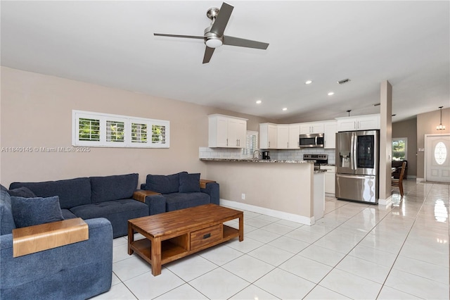 1710 SW 100th Ter, Davie, FL 33324 - living area with a ceiling fan, healthy amount of natural light, light tile patterned floors, and recessed lighting