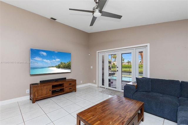 1710 SW 100th Ter, Davie, FL 33324 - living room featuring french doors, a ceiling fan, and light tile patterned floors