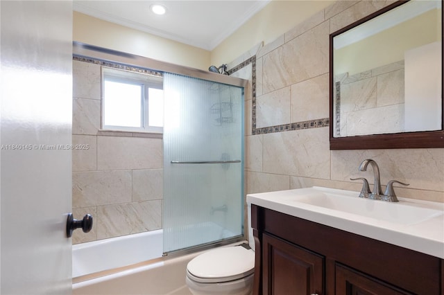 1710 SW 100th Ter, Davie, FL 33324 - bathroom featuring vanity, ornamental molding, shower / bath combination with glass door, and tile walls