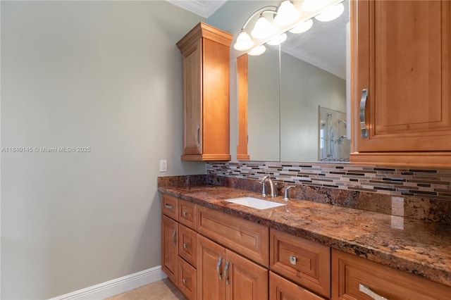 1710 SW 100th Ter, Davie, FL 33324 - bathroom featuring vanity, crown molding, decorative backsplash, and tile patterned flooring