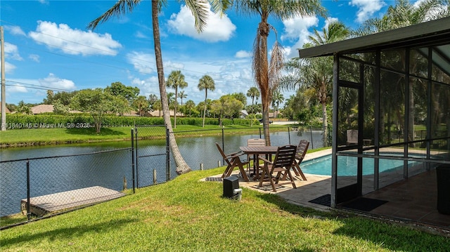1710 SW 100th Ter, Davie, FL 33324 - outdoor pool featuring a water view and a patio area
