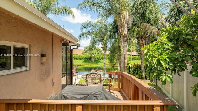 1710 SW 100th Ter, Davie, FL 33324 - wooden terrace featuring a water view