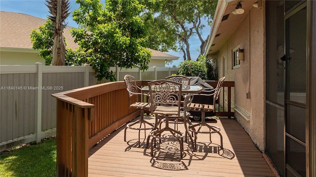 1710 SW 100th Ter, Davie, FL 33324 - wooden deck featuring outdoor dining area