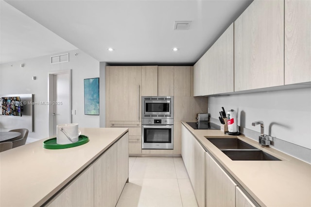 4111 S Ocean Dr Unit 2906, Hollywood, FL 33019 - kitchen featuring appliances with stainless steel finishes, light brown cabinets, modern cabinets, light countertops, and recessed lighting