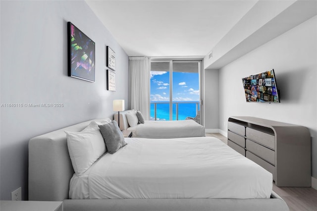 4111 S Ocean Dr Unit 2906, Hollywood, FL 33019 - bedroom featuring access to outside and wood finished floors