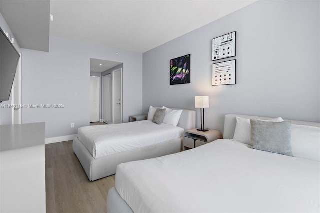 4111 S Ocean Dr Unit 2906, Hollywood, FL 33019 - bedroom with light wood-style flooring and baseboards