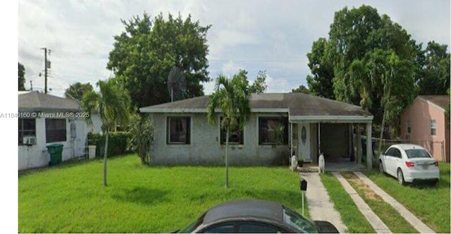 850 NE 172nd Ter, North Miami Beach, FL 33162 - view of front of property featuring driveway