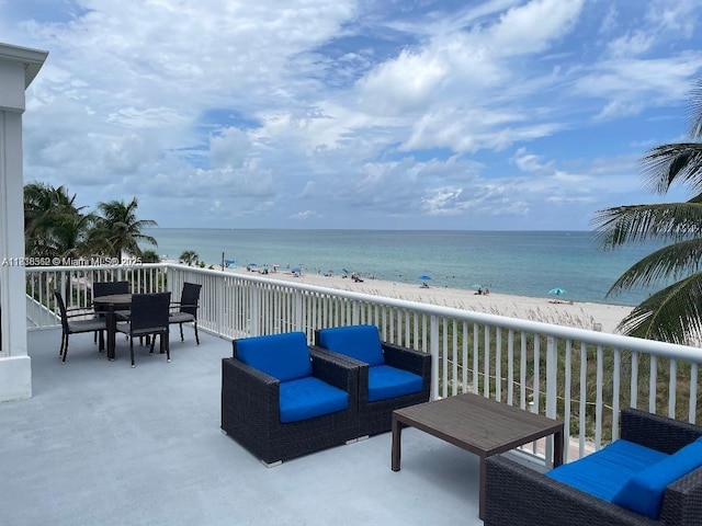 5401 Collins Ave Unit 514, Miami Beach, FL 33140 - view of patio featuring view of water and beach and outdoor dining area