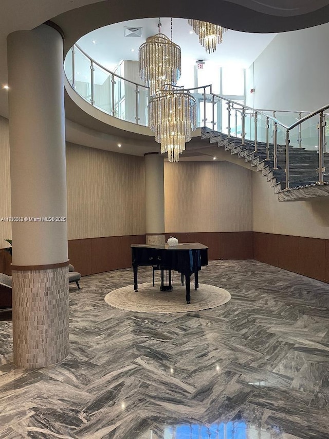 5401 Collins Ave Unit 514, Miami Beach, FL 33140 - lobby with a high ceiling and a wainscoted wall