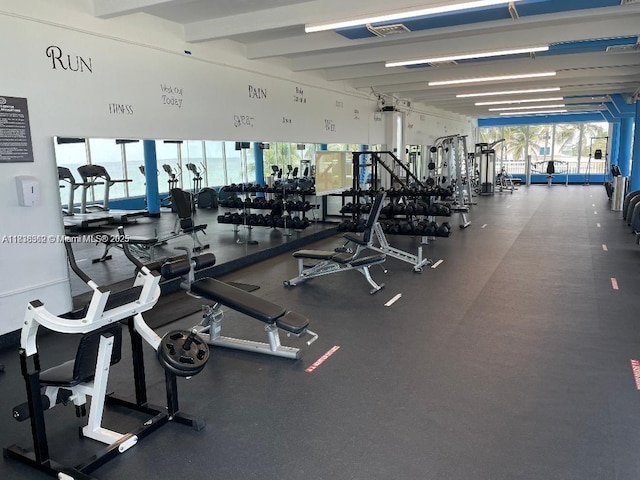 5401 Collins Ave Unit 514, Miami Beach, FL 33140 - exercise room with beamed ceiling