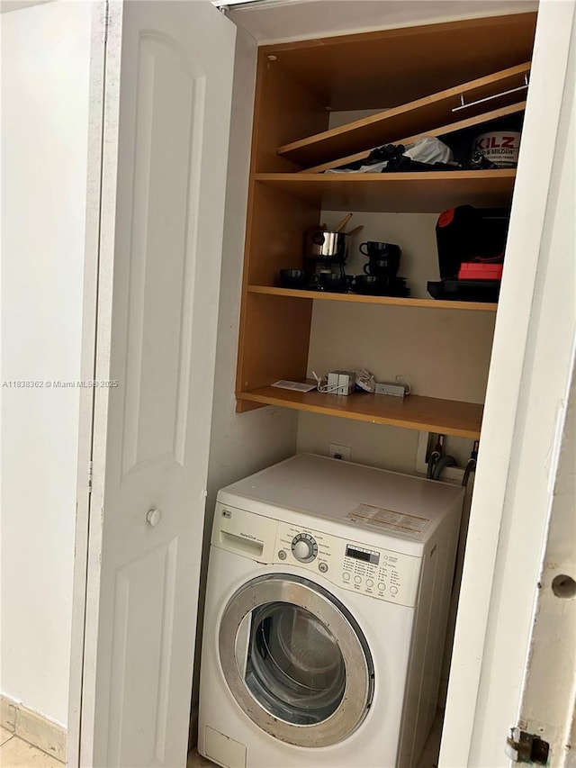 5401 Collins Ave Unit 514, Miami Beach, FL 33140 - washroom featuring washer / dryer