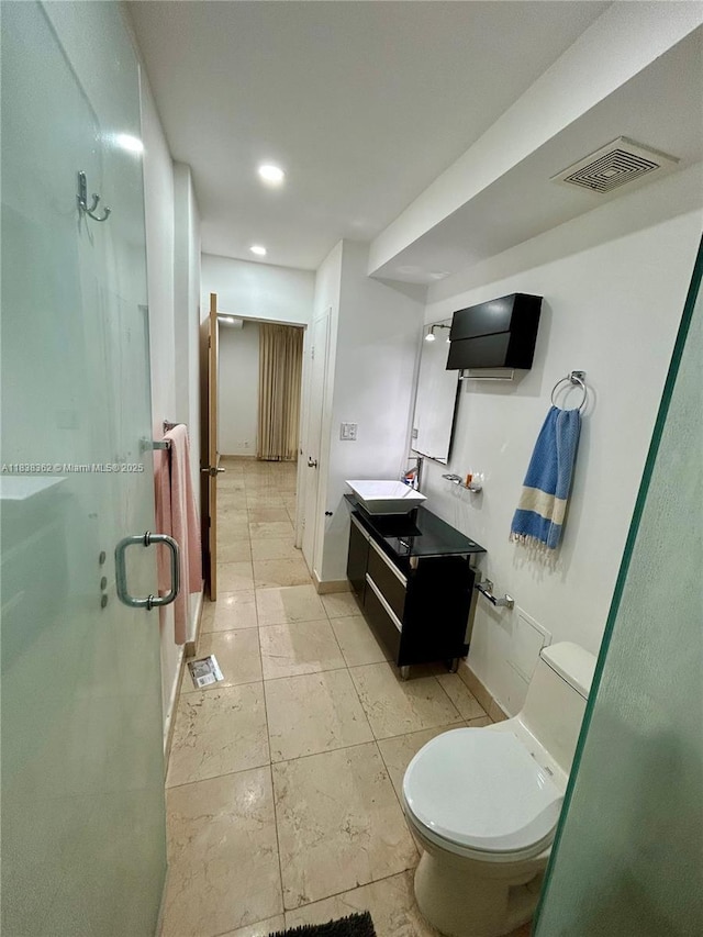 5401 Collins Ave Unit 514, Miami Beach, FL 33140 - bathroom with vanity, a shower stall, and recessed lighting