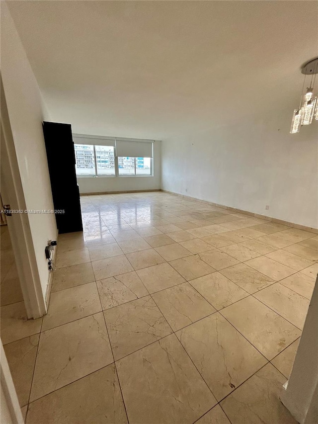 5401 Collins Ave Unit 514, Miami Beach, FL 33140 - empty room with light marble finish floors