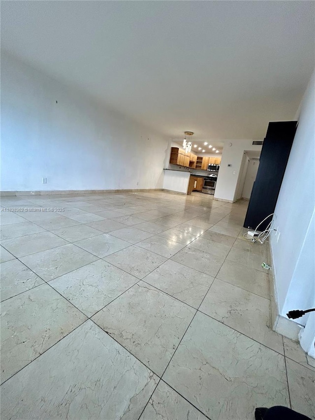 5401 Collins Ave Unit 514, Miami Beach, FL 33140 - unfurnished living room featuring light marble finish floors